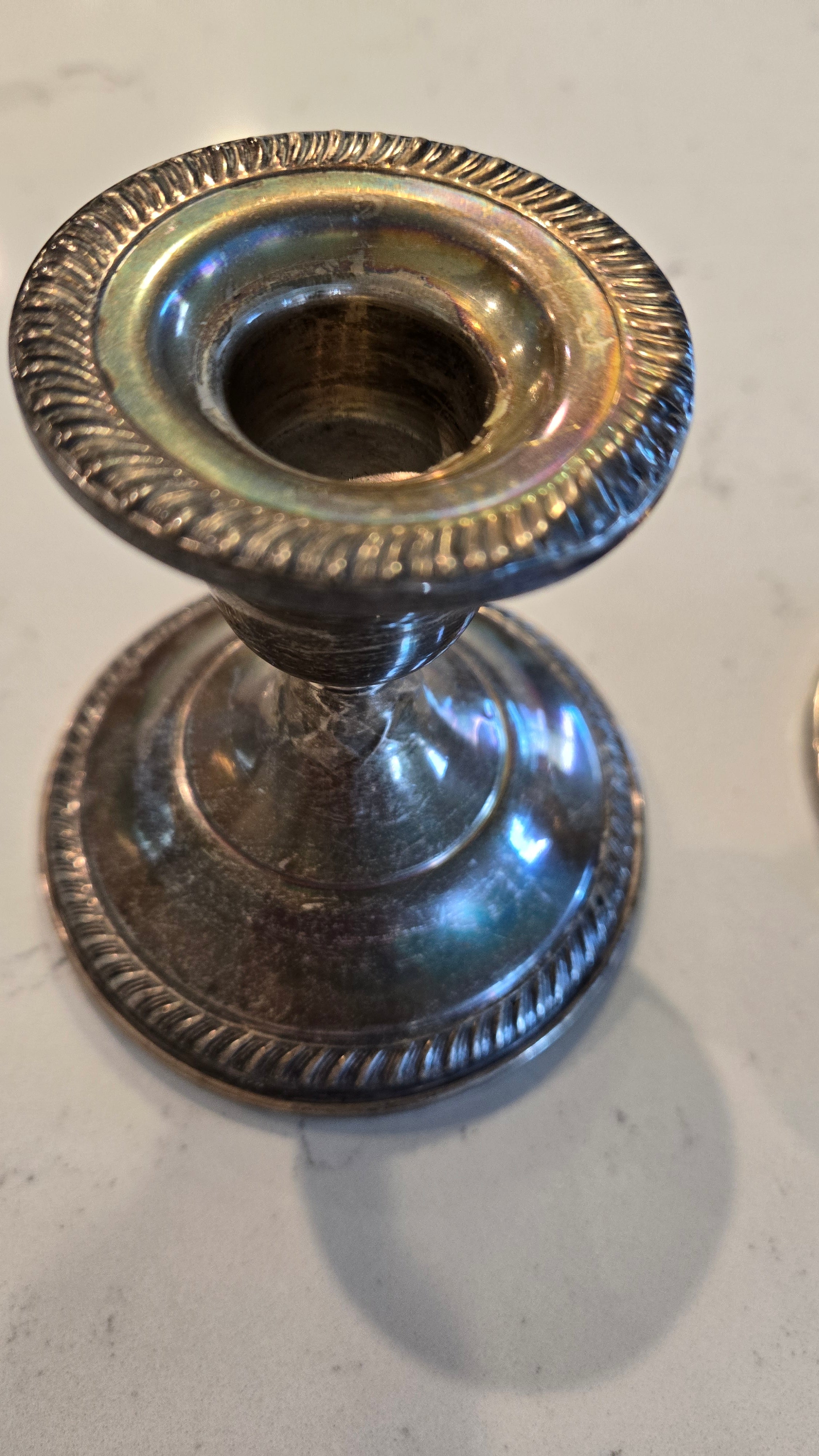 Pair Sterling Silver weighted Fisher Silversmith candle holders.